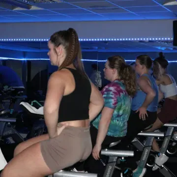 Group exercise cycling class.